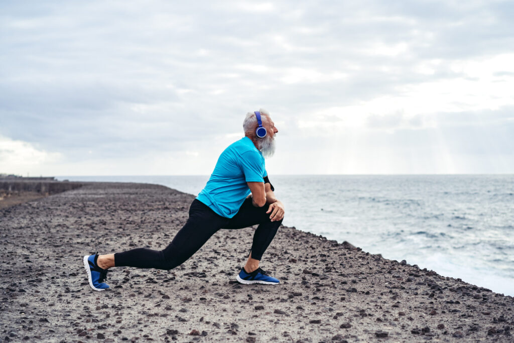 handsome senior man stretching